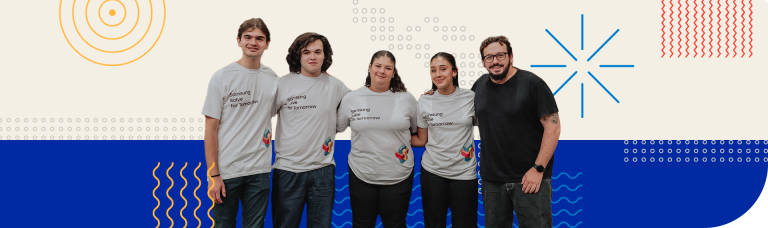Grupo de cinco jóvenes y un adulto usando camisetas del programa “Samsung Solve for Tomorrow” posando juntos frente a un fondo colorido. El proyecto que representan crea ladrillos ecológicos con 60% de material reciclado y enfocado en sostenibilidad y accesibilidad.