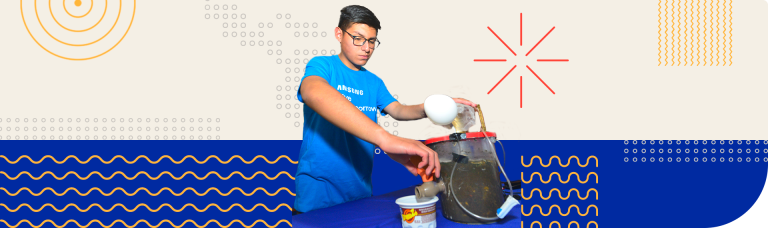 Young student operating a biodigester in an educational project.